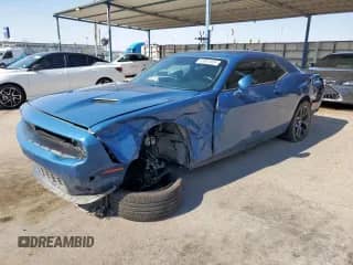 2021 Dodge Challenger SXT z VIN 2C3CDZAG7MH676226, wystawiony jako Copart lot #69842655 z przebiegiem 36 093 mil mil oraz Szkoda całkowita • Salvage title. Historia ofert i sprzedaży dostępna na DreamBid. Obrazek 1.