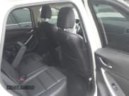 ✅ 2016 Mazda CX-5 Grand Touring • VIN: JM3KE4DY6G0873688 • Lot: 43565324. Wystawiony na IAAI z przebiegiem 80 920 mil. Bezpłatny archiwum sprzedaży aukcyjnych z USA i szczegółowy raport historii pojazdu na DreamBid. Zdjęcie 8.