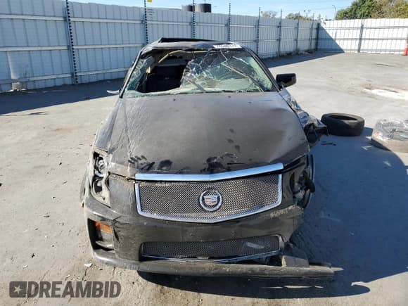 ✅ 2004 Cadillac CTS-V • VIN: 1G6DN57S840160286 • Лот: 74600374. Опубликован ранее на Copart с пробегом Не указан. Бесплатный доступ к архиву аукционных продаж из США и подробный отчёт об истории автомобиля на DreamBid. Изображение 5.