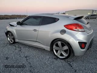 ✅ 2015 Hyundai Veloster Turbo • VIN: KMHTC6AE6FU240426 • Lot: 83579214. Wystawiony na Copart z przebiegiem 135 659 mil. Bezpłatny archiwum sprzedaży aukcyjnych z USA i szczegółowy raport historii pojazdu na DreamBid. Zdjęcie 2.