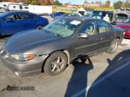 ✅ 2000 Pontiac Grand Prix GT • VIN: 1G2WP52K8YF182271 • Lot: 43603266. Listed on IAAI with 142,211 mi. Free auction sales archive from the USA and detailed vehicle history report at DreamBid. Image 2.