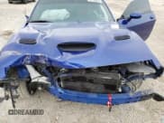 ✅ 2021 Dodge Challenger R/T Scat Pack • VIN: 2C3CDZFJ1MH580662 • Лот: 37158044. Опубликован ранее на Copart с пробегом 27 028 миль. Бесплатный доступ к архиву аукционных продаж из США и подробный отчёт об истории автомобиля на DreamBid. Изображение 12.