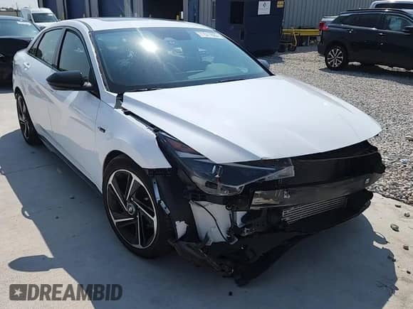 2022 Hyundai Elantra N Line с VIN KMHLR4AF1NU361634, выставлен на аукционе Copart как лот 71511685 с пробегом 26 684 миль миль и Списание • Salvage title. История ставок и продаж доступна на DreamBid. Изображение 14.