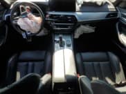 ✅ 2023 BMW M5 • VIN: WBS83CH03PCL49168 • Лот: 81989275. Опубликован ранее на Copart с пробегом Не указан. Бесплатный доступ к архиву аукционных продаж из США и подробный отчёт об истории автомобиля на DreamBid. Изображение 8.