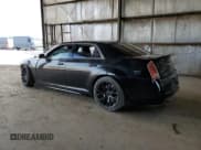 ✅ 2012 Chrysler 300 SRT-8 • VIN: 2C3CCAFJXCH801324 • Lot: 69152205. Listed on Copart with 106,995 mi. Free auction sales archive from the USA and detailed vehicle history report at DreamBid. Image 2.