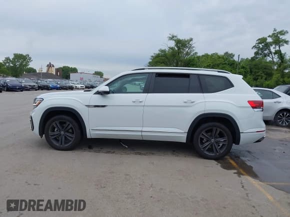 ✅ 2022 Volkswagen Atlas SEL R-Line • VIN: 1V2AR2CA2NC521381 • Lot: 42336328. Listed on IAAI with 59,097 mi. Free auction sales archive from the USA and detailed vehicle history report at DreamBid. Image 15.