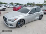 ✅ 2014 Infiniti Q50 Premium • VIN: JN1BV7AP4EM692135 • Lot: 38874654. Listed on IAAI with 104,348 mi. Free auction sales archive from the USA and detailed vehicle history report at DreamBid. Image 2.
