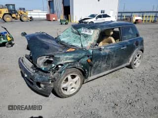 2007 MINI Hardtop with VIN WMWMF33587TT52905, listed as a Copart auction lot 81384195 with Not provided miles and Salvage title. Bid and sale history available at DreamBid. Image 1.