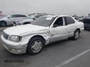 ✅ 1998 Lexus LS 400 • VIN: JT8BH28F4W0128982 • Лот: 42888791. Опубликован ранее на IAAI с пробегом 126 940 миль. Бесплатный доступ к архиву аукционных продаж из США и подробный отчёт об истории автомобиля на DreamBid. Изображение 2.