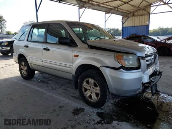 2006 Honda Pilot LX with VIN 5FNYF18116B012124, listed as a Copart auction lot 82311145 with 159,515 mi miles and Salvage title. Bid and sale history available at DreamBid. Image 4.