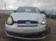 2007 Hyundai Accent GS z VIN KMHCM36CX7U031808, wystawiony jako Copart lot #78204324 z przebiegiem 178 172 mil mil oraz Szkoda całkowita • Salvage title. Historia ofert i sprzedaży dostępna na DreamBid. Obrazek 5.