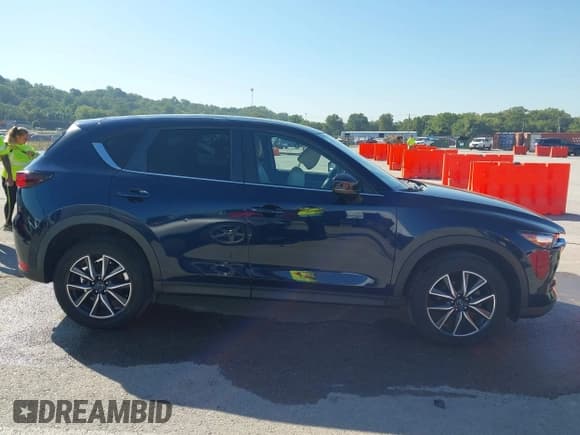 ✅ 2018 Mazda CX-5 Touring • VIN: JM3KFACM5J1473522 • Lot: 43315278. Listed on IAAI with 56,327 mi. Free auction sales archive from the USA and detailed vehicle history report at DreamBid. Image 13.