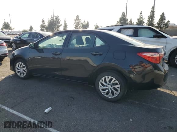✅ 2019 Toyota Corolla L • VIN: 5YFBURHE9KP911874 • Lot: 82703205. Listed on Copart with 66,728 mi. Free auction sales archive from the USA and detailed vehicle history report at DreamBid. Image 2.