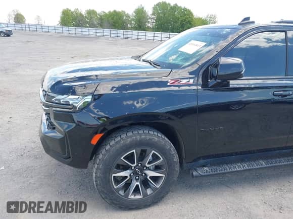 2022 Chevrolet Tahoe Z71 z VIN 1GNSKPKD2NR174478, wystawiony jako IAAI lot #42016813 z przebiegiem 71 801 mil mil oraz . Historia ofert i sprzedaży dostępna na DreamBid. Obrazek 12.