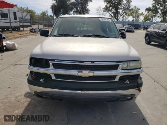 2004 Chevrolet Suburban LS с VIN 1GNEC16T54J184718, выставлен на аукционе Copart как лот 74020304 с пробегом Не указан миль и Списание • Salvage title. История ставок и продаж доступна на DreamBid. Изображение 5.