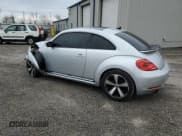 ✅ 2012 Volkswagen Beetle Turbo • VIN: 3VWVA7AT8CM628164 • Lot: 85227914. Wystawiony na Copart z przebiegiem 89 403 mil. Bezpłatny archiwum sprzedaży aukcyjnych z USA i szczegółowy raport historii pojazdu na DreamBid. Zdjęcie 2.