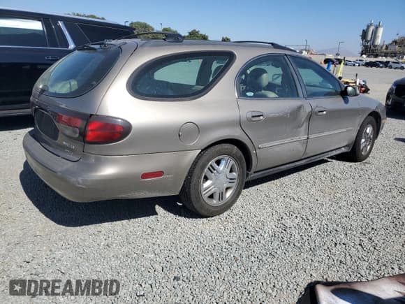 ✅ 2005 Mercury Sable LS Premium • VIN: 1MEHM59S05A611820 • Lot: 66543005. Listed on Copart with 58,353 mi. Free auction sales archive from the USA and detailed vehicle history report at DreamBid. Image 3.