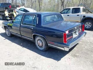 ✅ 1988 Cadillac Fleetwood • VIN: 1G6CB5153J4265796 • Лот: 42129869. Опубликован ранее на IAAI с пробегом 63 756 миль. Бесплатный доступ к архиву аукционных продаж из США и подробный отчёт об истории автомобиля на DreamBid. Изображение 3.