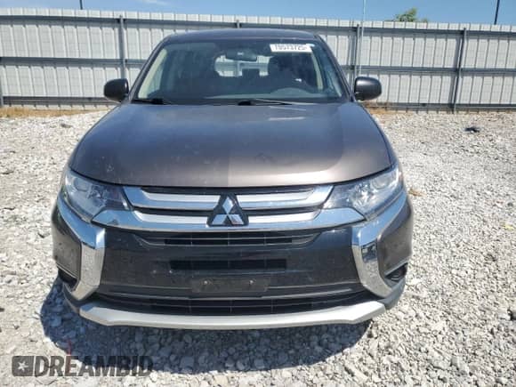 2018 Mitsubishi Outlander ES with VIN JA4AZ3A39JZ027175, listed as a Copart auction lot 70573725 with 197,576 mi miles and Salvage title. Bid and sale history available at DreamBid. Image 5.