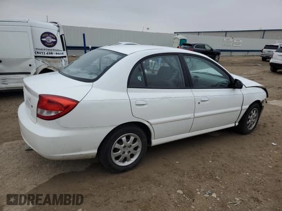 ✅ 2003 Kia Rio • VIN: KNADC125136274488 • Лот: 79561204. Опубликован ранее на Copart с пробегом 117 608 миль. Бесплатный доступ к архиву аукционных продаж из США и подробный отчёт об истории автомобиля на DreamBid. Изображение 3.