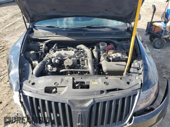 ✅ 2011 Lincoln MKS EcoBoost • VIN: 1LNHL9FT9BG606659 • Лот: 87272685. Опубликован ранее на Copart с пробегом Не указан. Бесплатный доступ к архиву аукционных продаж из США и подробный отчёт об истории автомобиля на DreamBid. Изображение 11.