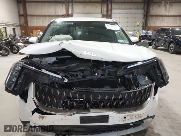 ✅ 2025 Kia Carnival LXS • VIN: KNDNB5K33S6457325 • Lot: 43502824. Listed on IAAI with 18,304 mi. Free auction sales archive from the USA and detailed vehicle history report at DreamBid. Image 12.