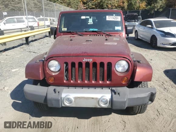 ✅ 2010 Jeep Wrangler Sahara • VIN: 1J4GA5D16AL225139 • Lot: 77114204. Listed on Copart with Not provided. Free auction sales archive from the USA and detailed vehicle history report at DreamBid. Image 5.