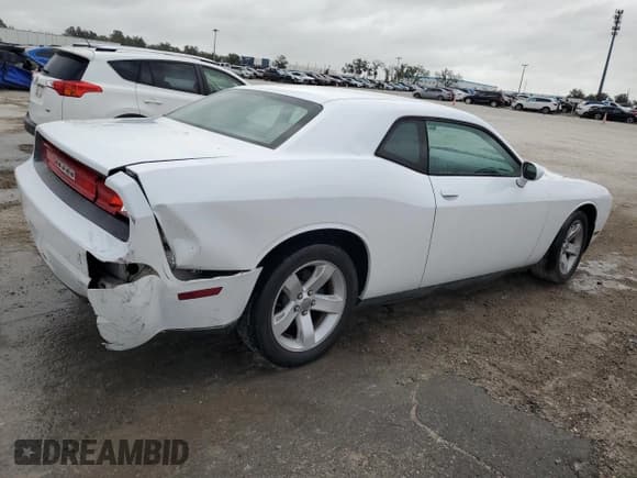 ✅ 2013 Dodge Challenger SXT • VIN: 2C3CDYAG2DH628143 • Lot: 84862114. Listed on Copart with 146,414 mi. Free auction sales archive from the USA and detailed vehicle history report at DreamBid. Image 3.