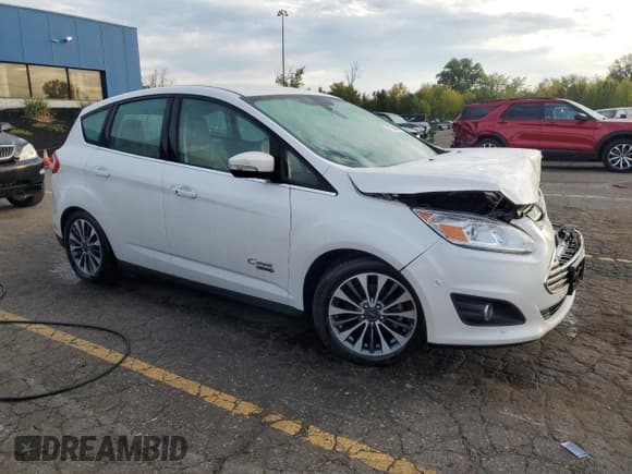 ✅ 2017 Ford C-Max Titanium • VIN: 1FADP5FU8HL106877 • Лот: 71734905. Опубликован ранее на Copart с пробегом 73 633 миль. Бесплатный доступ к архиву аукционных продаж из США и подробный отчёт об истории автомобиля на DreamBid. Изображение 4.