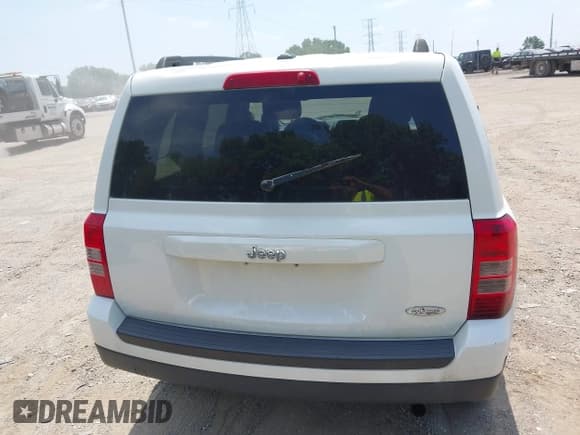 ✅ 2014 Jeep Patriot Latitude • VIN: 1C4NJPFA3ED682027 • Lot: 42794960. Listed on IAAI with 108,247 mi. Free auction sales archive from the USA and detailed vehicle history report at DreamBid. Image 16.