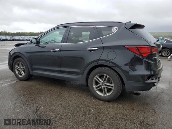 ✅ 2018 Hyundai Santa Fe 2.4L • VIN: 5NMZUDLB3JH097597 • Лот: 55040354. Опубликован ранее на Copart с пробегом 111 857 миль. Бесплатный доступ к архиву аукционных продаж из США и подробный отчёт об истории автомобиля на DreamBid. Изображение 2.