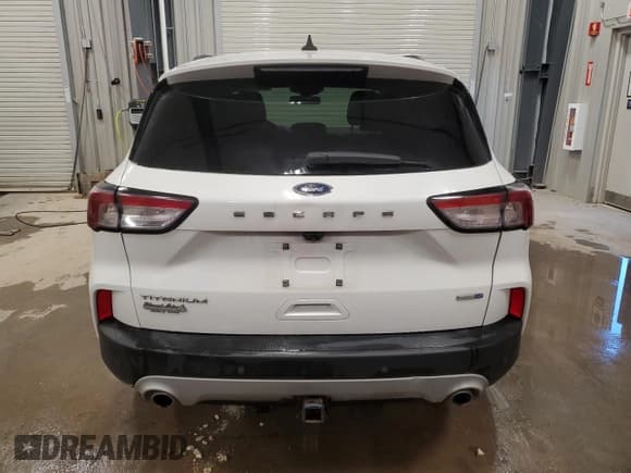 ✅ 2020 Ford Escape Titanium • VIN: 1FMCU9J99LUB15711 • Lot: 86680545. Listed on Copart with 75,531 mi. Free auction sales archive from the USA and detailed vehicle history report at DreamBid. Image 6.