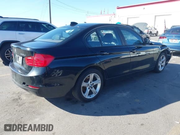 ✅ 2014 BMW 3 Series 328d xDrive • VIN: WBA3D5C5XEKX98831 • Lot: 43373645. Listed on IAAI with 262,316 mi. Free auction sales archive from the USA and detailed vehicle history report at DreamBid. Image 4.