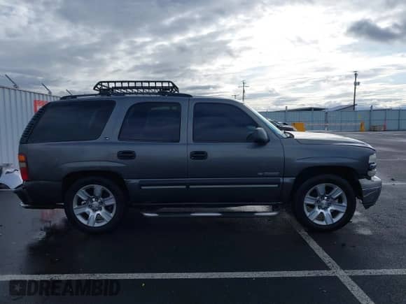 2001 Chevrolet Tahoe LT z VIN 1GNEK13T61R102886, wystawiony jako IAAI lot #41870940 z przebiegiem 267 769 mil mil oraz . Historia ofert i sprzedaży dostępna na DreamBid. Obrazek 14.