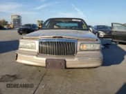 ✅ 1997 Lincoln Town Car Executive • VIN: 1LNLM81W4VY667600 • Lot: 73100824. Listed on Copart with Not provided. Free auction sales archive from the USA and detailed vehicle history report at DreamBid. Image 5.