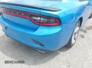 ✅ 2015 Dodge Charger SXT • VIN: 2C3CDXHG3FH827754 • Lot: 42012425. Listed on IAAI with 119,057 mi. Free auction sales archive from the USA and detailed vehicle history report at DreamBid. Image 6.