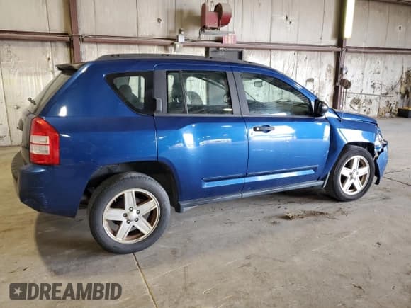 ✅ 2010 Jeep Compass Sport • VIN: 1J4NT4FB7AD506989 • Лот: 66659335. Опубликован ранее на Copart с пробегом 92 151 миль. Бесплатный доступ к архиву аукционных продаж из США и подробный отчёт об истории автомобиля на DreamBid. Изображение 3.
