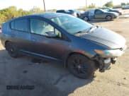 ✅ 2010 Honda Insight EX • VIN: JHMZE2H73AS043435 • Lot: 43775354. Listed on IAAI with 296,662 mi. Free auction sales archive from the USA and detailed vehicle history report at DreamBid. Image 1.