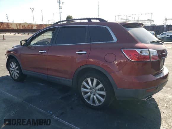 ✅ 2010 Mazda CX-9 Grand Touring • VIN: JM3TB2MV2A0202999 • Лот: 68116945. Опубликован ранее на Copart с пробегом 195 944 миль. Бесплатный доступ к архиву аукционных продаж из США и подробный отчёт об истории автомобиля на DreamBid. Изображение 2.