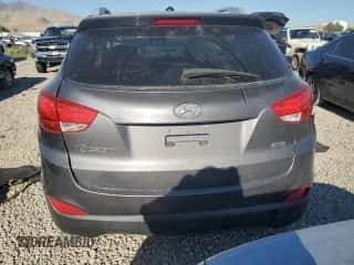 2015 Hyundai Tucson SE z VIN KM8JUCAG8FU007653, wystawiony jako Copart lot #69103044 z przebiegiem 143 509 mil mil oraz Szkoda całkowita • Salvage title. Historia ofert i sprzedaży dostępna na DreamBid. Obrazek 6.