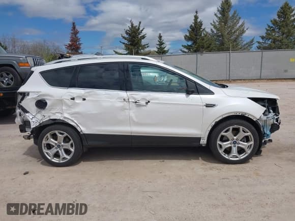 ✅ 2019 Ford Escape Titanium • VIN: 1FMCU9J99KUC21963 • Лот: 42186434. Опубликован ранее на IAAI с пробегом 60 578 миль. Бесплатный доступ к архиву аукционных продаж из США и подробный отчёт об истории автомобиля на DreamBid. Изображение 13.