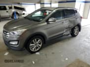 ✅ 2014 Hyundai Santa Fe • VIN: 5XYZU3LA6EG207690 • Лот: 63659934. Опубликован ранее на Copart с пробегом 76 843 миль. Бесплатный доступ к архиву аукционных продаж из США и подробный отчёт об истории автомобиля на DreamBid. Изображение 1.