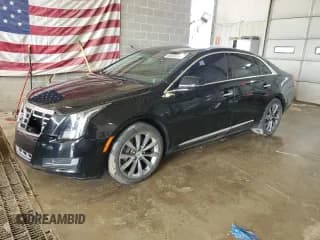 ✅ 2013 Cadillac XTS Livery • VIN: 2G61W5S34D9225205 • Lot: 66868504. Listed on Copart with 131,426 mi. Free auction sales archive from the USA and detailed vehicle history report at DreamBid. Image 1.