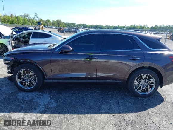 ✅ 2023 Genesis GV70 2.5T • VIN: KMUMADTB4PU100783 • Lot: 43537248. Listed on IAAI with 55,576 mi. Free auction sales archive from the USA and detailed vehicle history report at DreamBid. Image 15.