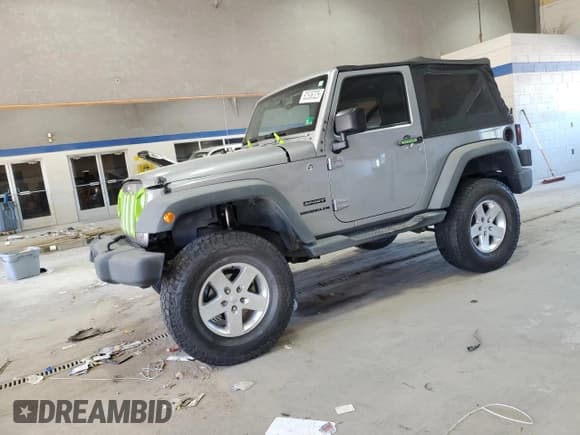 ✅ 2014 Jeep Wrangler Sport • VIN: 1C4AJWAG7EL311978 • Лот: 82536325. Опубликован ранее на Copart с пробегом 165 612 миль. Бесплатный доступ к архиву аукционных продаж из США и подробный отчёт об истории автомобиля на DreamBid. Изображение 1.