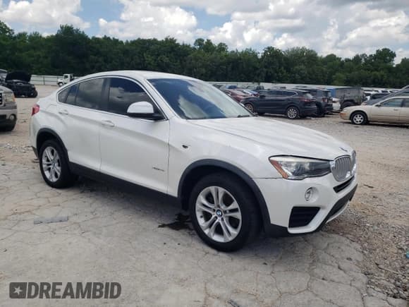✅ 2015 BMW X4 xDrive28i • VIN: 5UXXW3C57F0M88215 • Lot: 62342155. Listed on Copart with 178,621 mi. Free auction sales archive from the USA and detailed vehicle history report at DreamBid. Image 4.