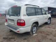 ✅ 1999 Lexus LX 470 • VIN: JT6HT00W0X0037341 • Lot: 41813009. Listed on IAAI with 190,343 mi. Free auction sales archive from the USA and detailed vehicle history report at DreamBid. Image 4.