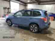 2017 Subaru Forester Limited with VIN JF2SJAJC5HH527843, listed as a Copart auction lot 82440135 with 64,197 mi miles and Salvage title. Bid and sale history available at DreamBid. Image 2.