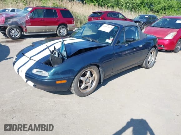 ✅ 1996 Mazda MX-5 Miata • VIN: JM1NA3533T0716564 • Lot: 42191052. Listed on IAAI with 101,713 mi. Free auction sales archive from the USA and detailed vehicle history report at DreamBid. Image 2.