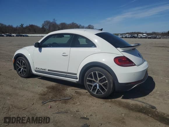 ✅ 2016 Volkswagen Beetle Dune • VIN: 3VWS17AT5GM629815 • Lot: 54207105. Wystawiony na Copart z przebiegiem 94 869 mil. Bezpłatny archiwum sprzedaży aukcyjnych z USA i szczegółowy raport historii pojazdu na DreamBid. Zdjęcie 2.